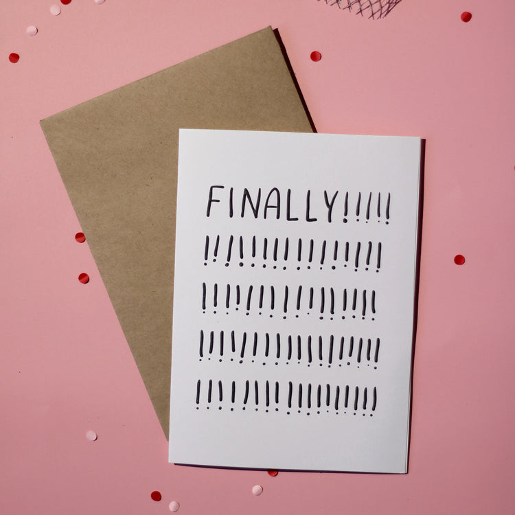 A white card with 'FINALLY!!!!!' text on a pink background.