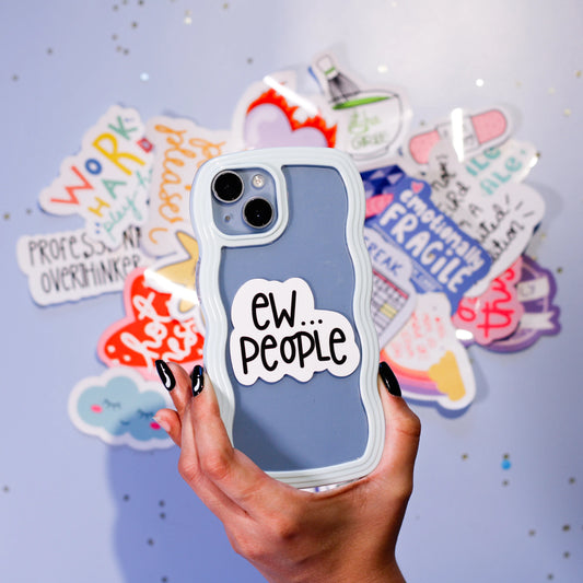 Phone case with 'EW... PEOPLE' sticker against a colorful background.