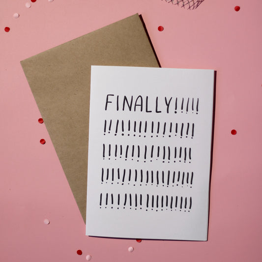 A white card with 'FINALLY!!!!!' text on a pink background.