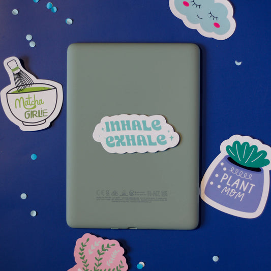 An 'Inhale Exhale' sticker on a blue background,